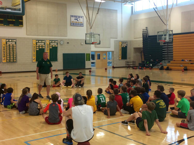 NRHS Boys Coach Joe Casey speaks to the campers about how special it is to play for your hometown.